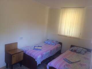 Гостевой дом Гостевой дом Южная Пальмира Пицунда Двухместный номер с 2 отдельными кроватями, вид на сад-7