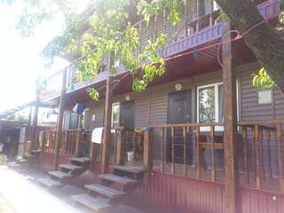 Гостевой дом Гостевой дом Южная Пальмира Пицунда Трехместный номер, вид на сад-3